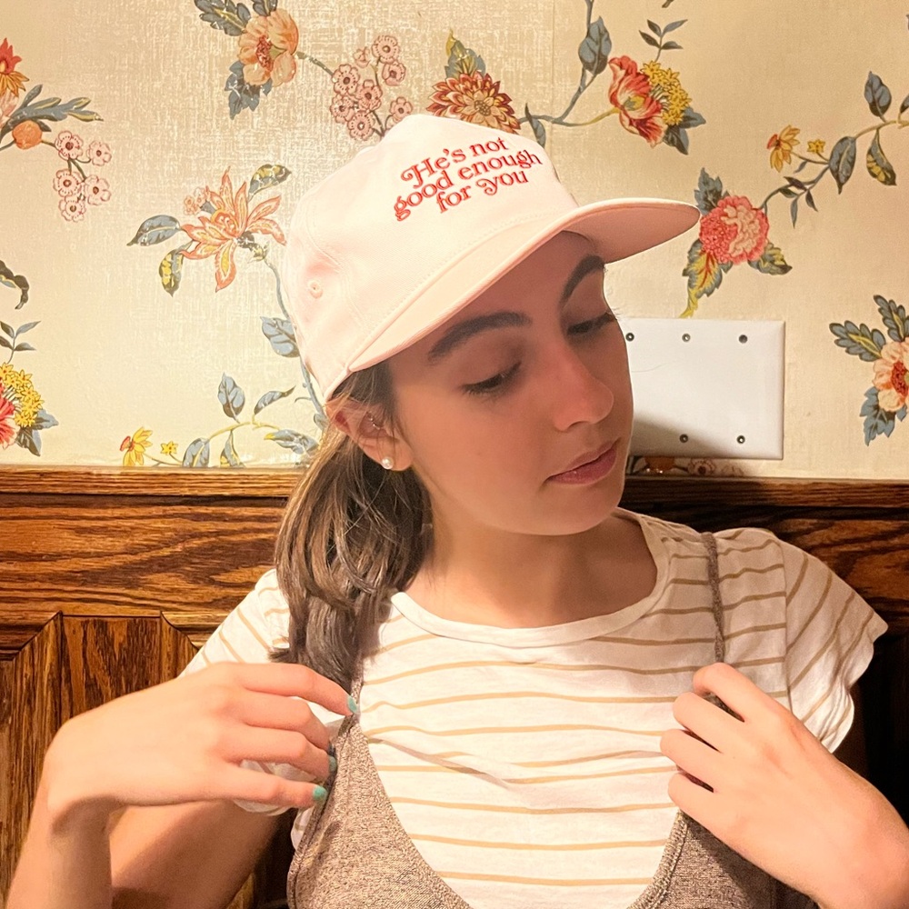 “He’s not good enough for you” pink hat